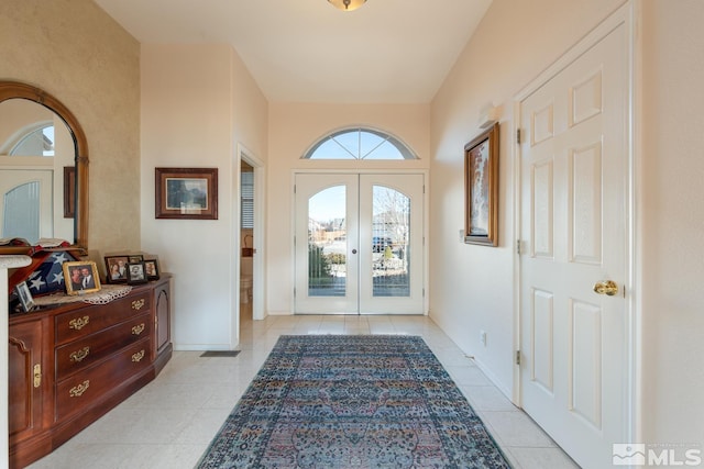 tiled entrance foyer with french doors