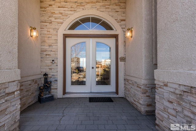 view of exterior entry with french doors