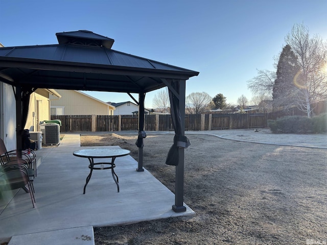 view of patio featuring a gazebo and central AC unit