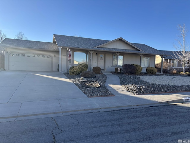 ranch-style house featuring a garage