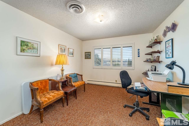 office space featuring a textured ceiling, carpet flooring, and a baseboard heating unit