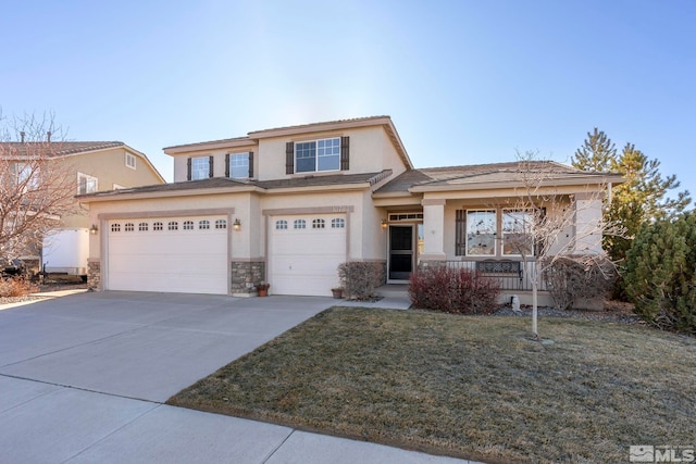 view of front of house with a garage, a porch, and a front lawn