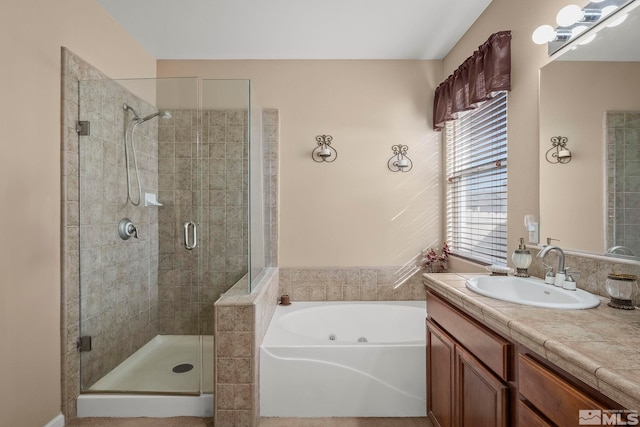 bathroom with plus walk in shower and vanity