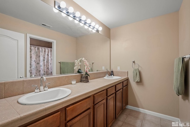 bathroom featuring vanity and tile patterned floors