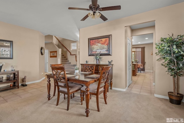 tiled dining room with ceiling fan