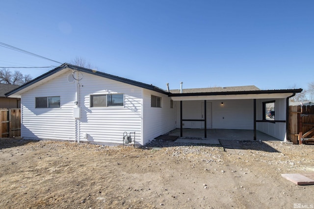 rear view of house with a patio