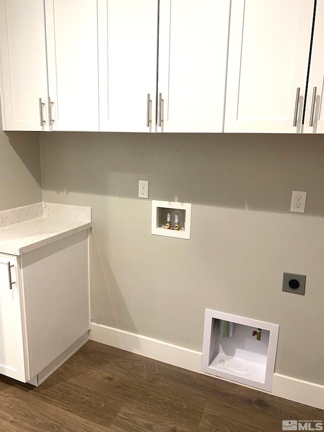 washroom with cabinets, hookup for an electric dryer, dark hardwood / wood-style flooring, and washer hookup