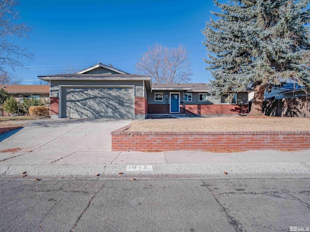 ranch-style house featuring a garage