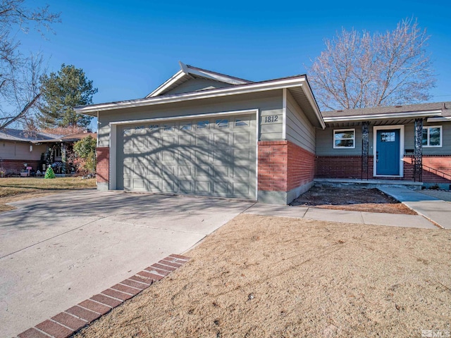 single story home with a garage