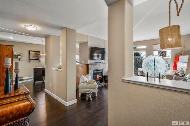 corridor featuring dark hardwood / wood-style flooring