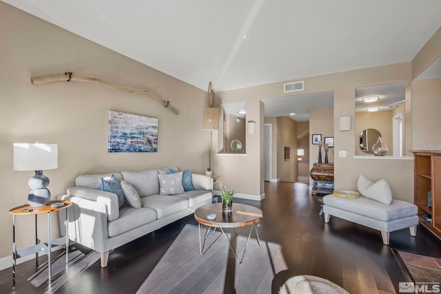 living room featuring dark hardwood / wood-style flooring