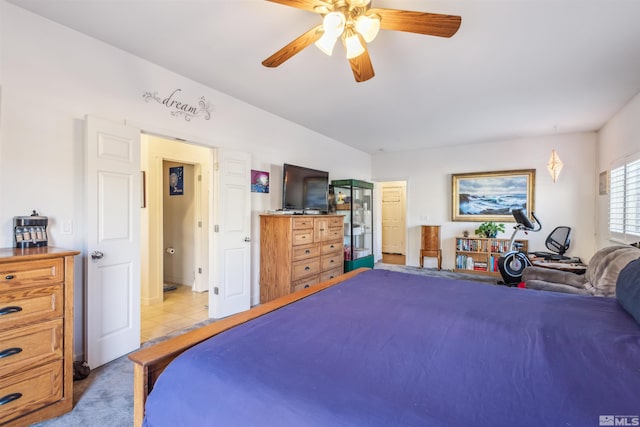 bedroom featuring ceiling fan and light tile patterned floors