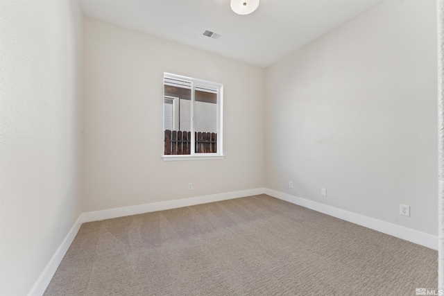 unfurnished room with carpet flooring