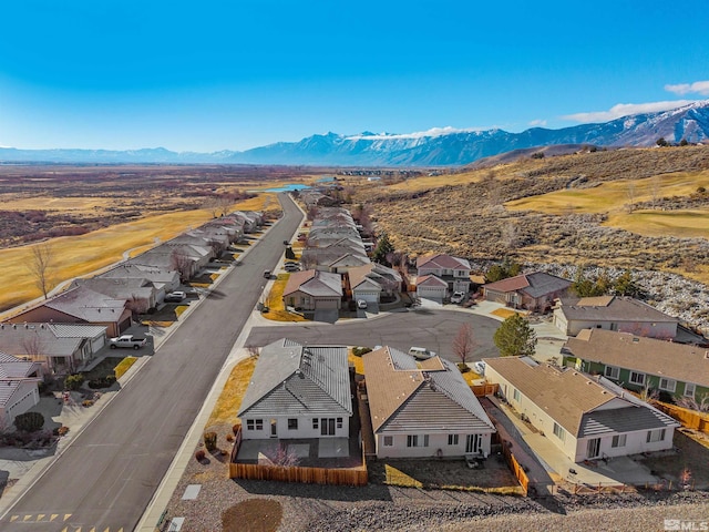 drone / aerial view featuring a mountain view