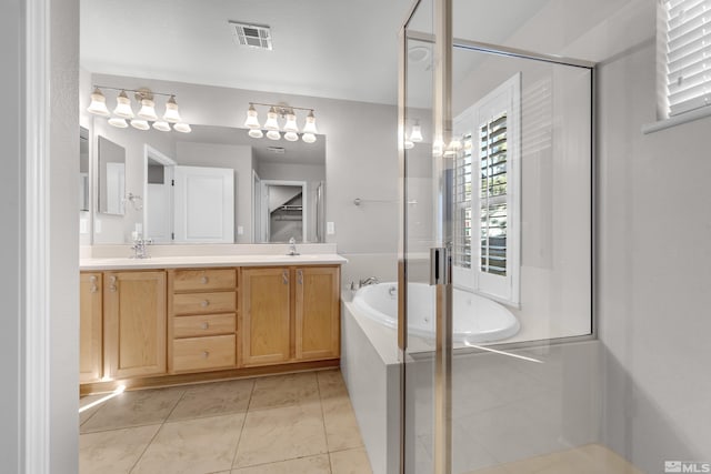 bathroom featuring separate shower and tub, tile patterned flooring, and vanity