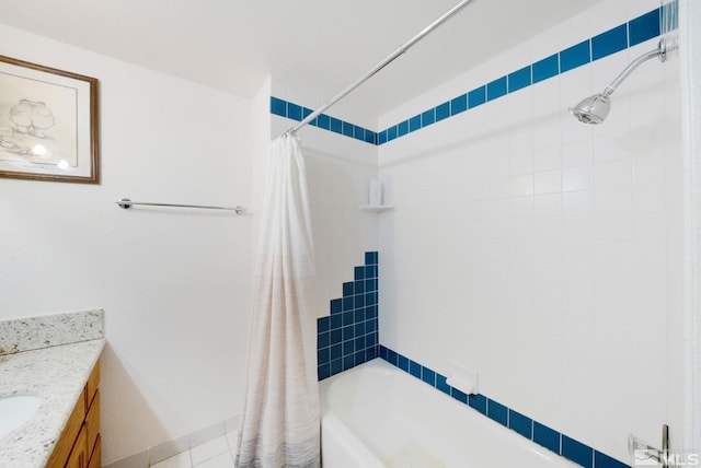 bathroom featuring tile patterned flooring, shower / bath combination with curtain, and vanity