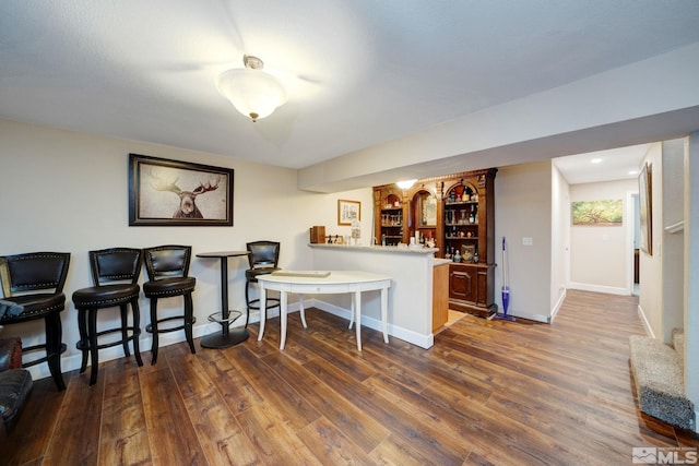 interior space with dark hardwood / wood-style floors