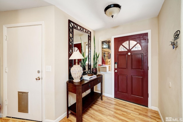 foyer entrance featuring light wood-type flooring