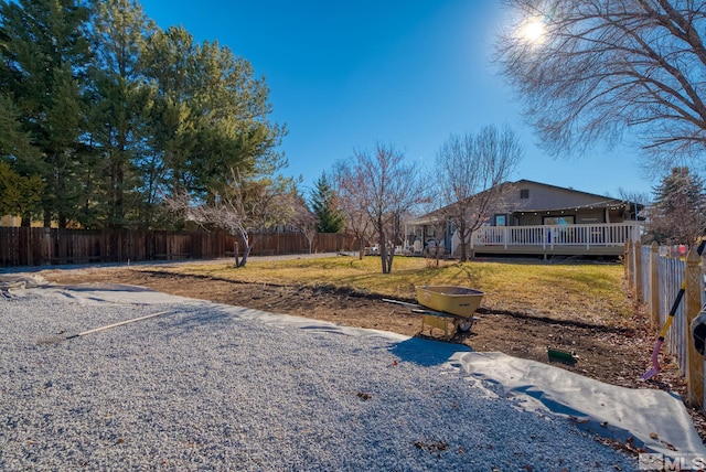 view of yard featuring a deck