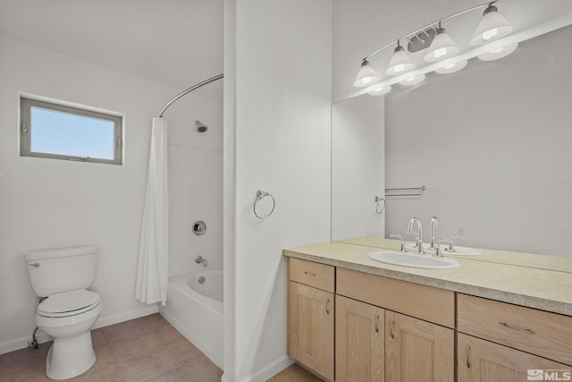 full bathroom with vanity, tile patterned floors, shower / bath combo with shower curtain, and toilet