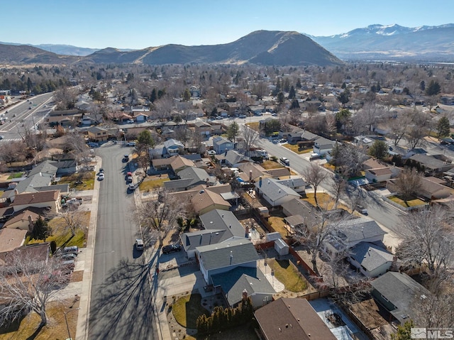 drone / aerial view featuring a mountain view