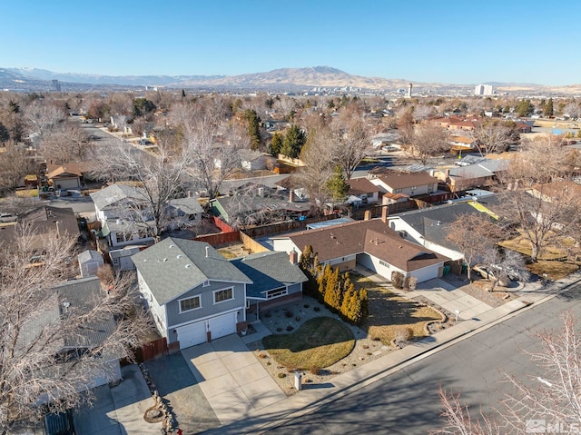 drone / aerial view featuring a mountain view