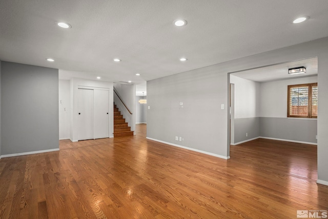 unfurnished room featuring wood-type flooring