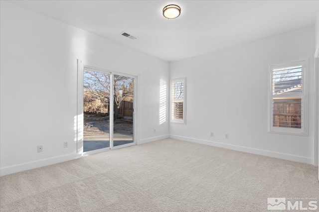 unfurnished room with carpet