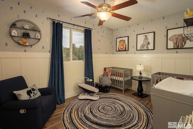 sitting room featuring dark hardwood / wood-style flooring