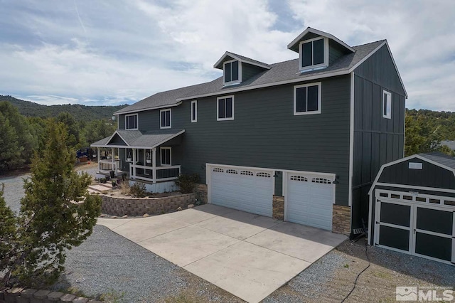 exterior space featuring a garage and a porch