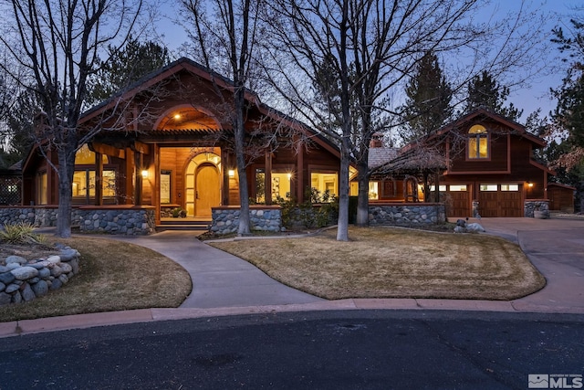 view of front of property with a garage