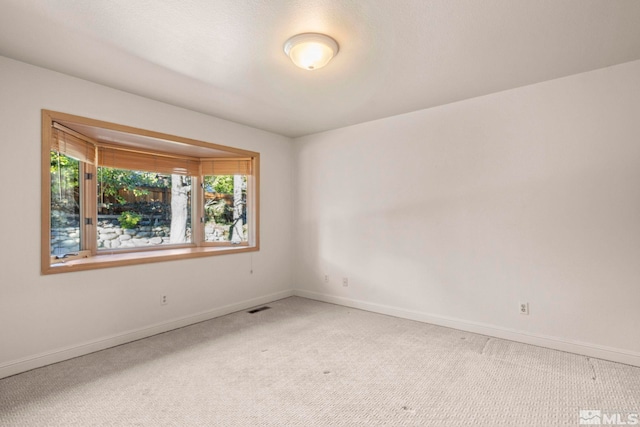 empty room with carpet floors