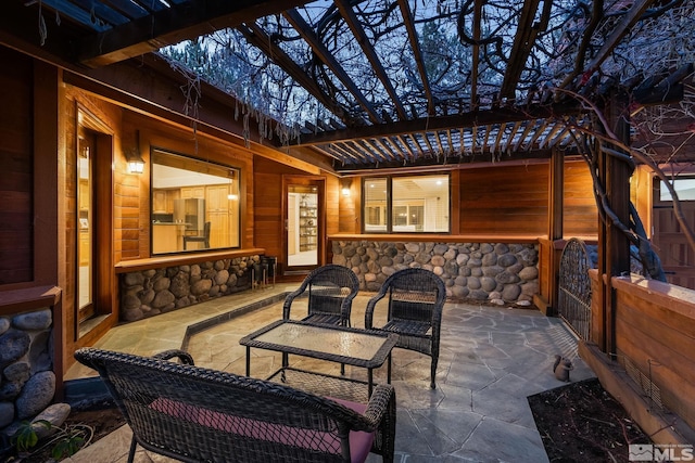 view of patio featuring a pergola