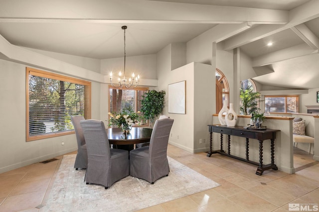 tiled dining space featuring an inviting chandelier and vaulted ceiling