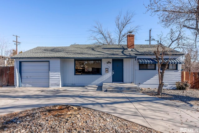 single story home featuring a garage