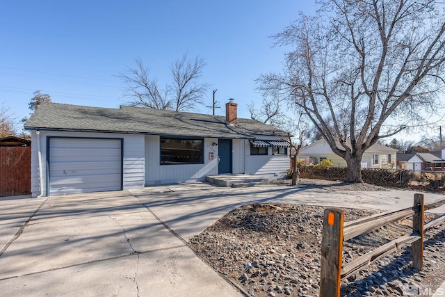 ranch-style home with a garage