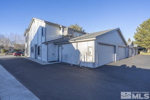 view of home's exterior featuring a garage