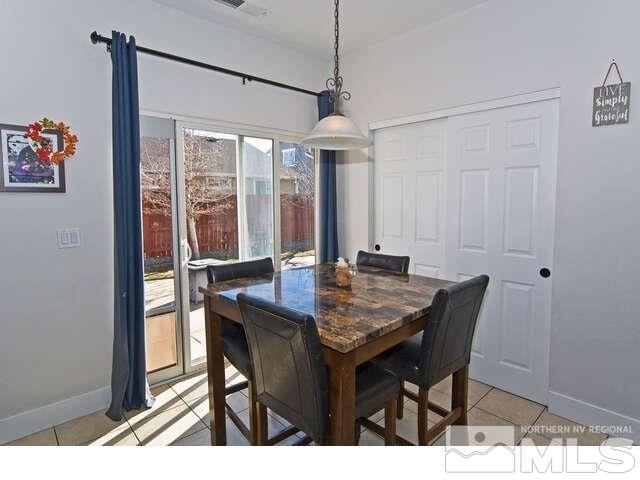 dining room with light tile patterned floors