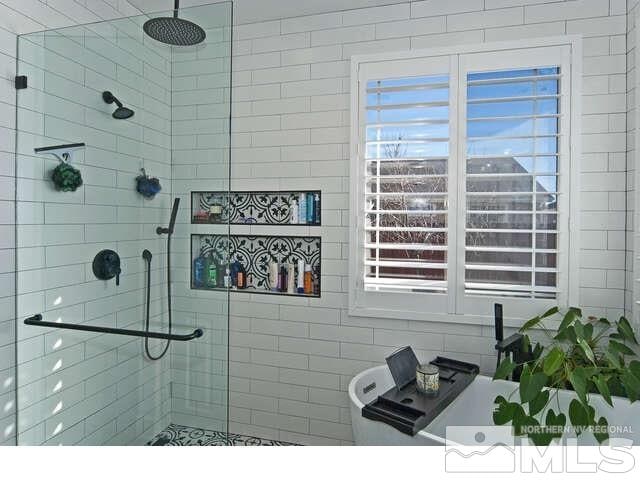 bathroom featuring walk in shower