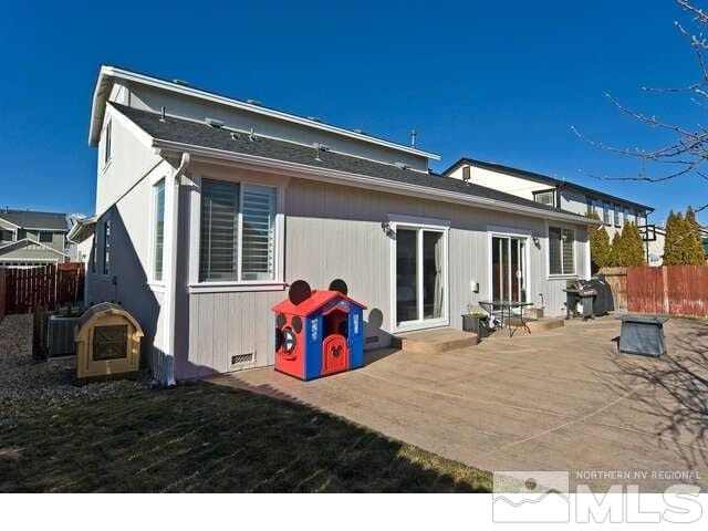 rear view of house featuring a patio