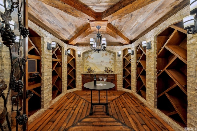 wine cellar with wood ceiling, a chandelier, and beamed ceiling