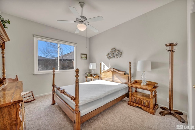 bedroom featuring ceiling fan and light carpet