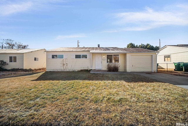 ranch-style house with a front lawn and a garage