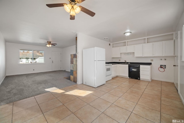 kitchen featuring white appliances, light colored carpet, white cabinetry, ceiling fan, and sink