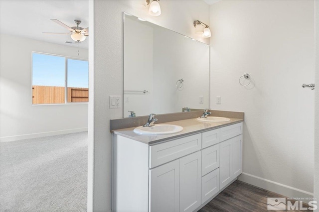 bathroom featuring vanity and ceiling fan