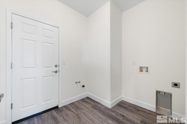 laundry area featuring gas dryer hookup, hookup for a washing machine, electric dryer hookup, and dark hardwood / wood-style floors