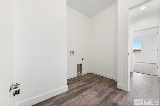 laundry room featuring dark hardwood / wood-style flooring, hookup for a washing machine, and electric dryer hookup