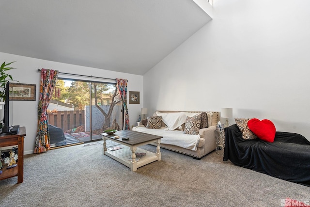 carpeted living room featuring high vaulted ceiling