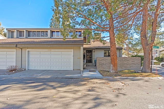 front of property with a garage