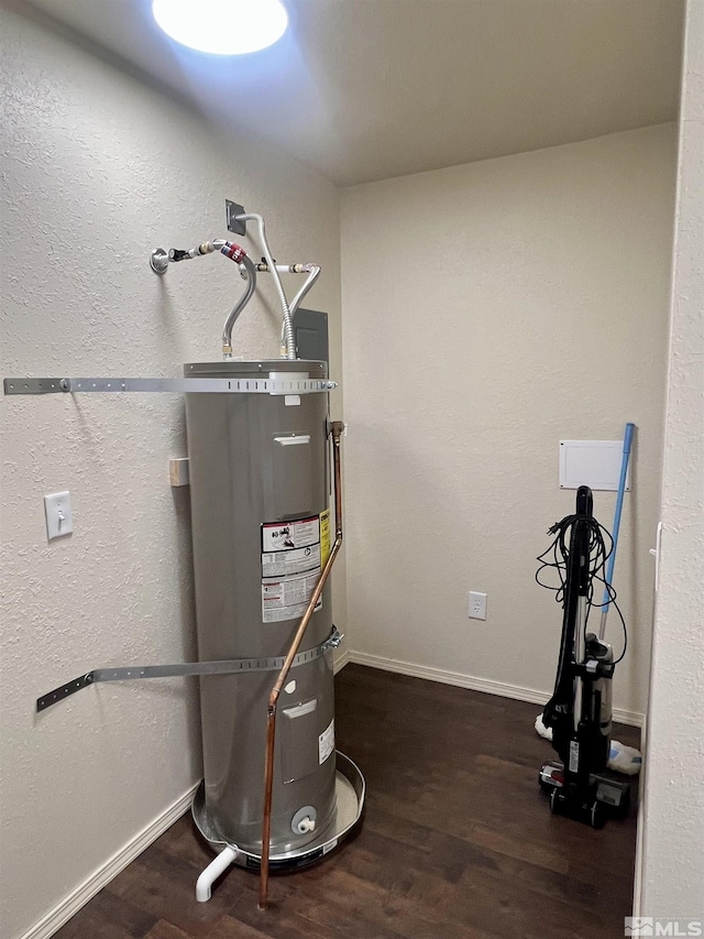 utility room with secured water heater